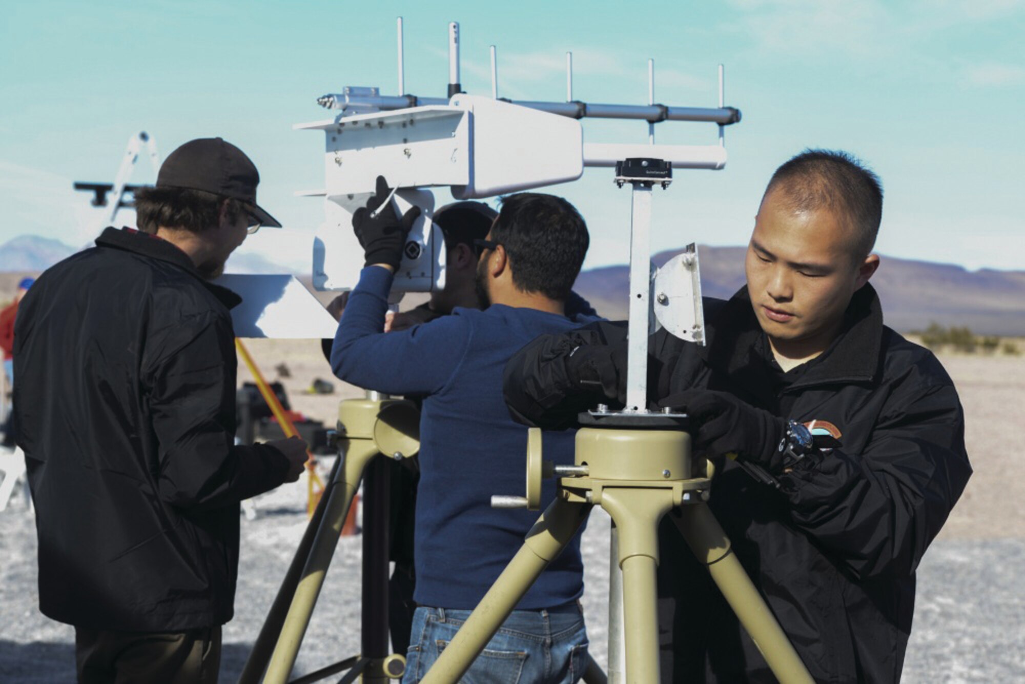 Members of Team Kirtland working to set up radar detection and video tracking equipment during last year's AFRL Commander's Challenge competition Dec. 8-16 in Nevada. Kirtland is hoping to have a team in this year's competition as well. 
