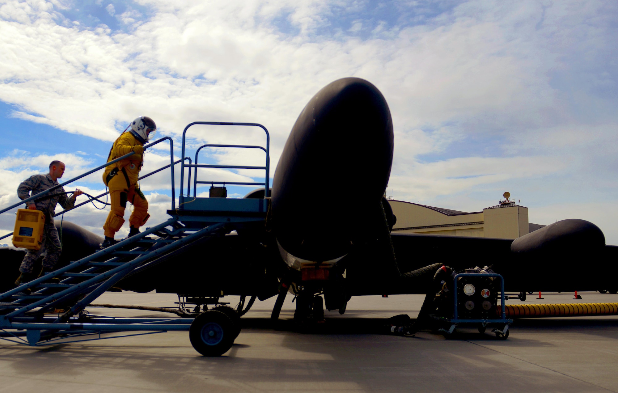 A U-2 Dragon Lady pilot climbs to the cockpit during exercise Northern Edge 17 at Joint Base at Joint Base Elmendorf-Richardson, Alaska, May 9, 2017. Northern Edge is a biennial joint training exercise involving approximately 6,000 personnel and 200 fixed-wing aircraft, and dates back to 1975. (U.S. Air Force photo/Staff Sgt. Jeffrey Schultze)
