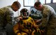 9th Physiological Support Squadron launch and recovery technicians, conduct a pre-flight inspection on a full-pressure suit at Joint Base Elmendorf-Richardson, Alaska, May 8, 2017. The U-2 Dragon Lady participated for the first time in exercise Northern Edge, which is a joint exercise that involves over 200 fixed-wing aircraft. (U.S. Air Force photo/Staff Sgt. Jeffrey Schultze)
