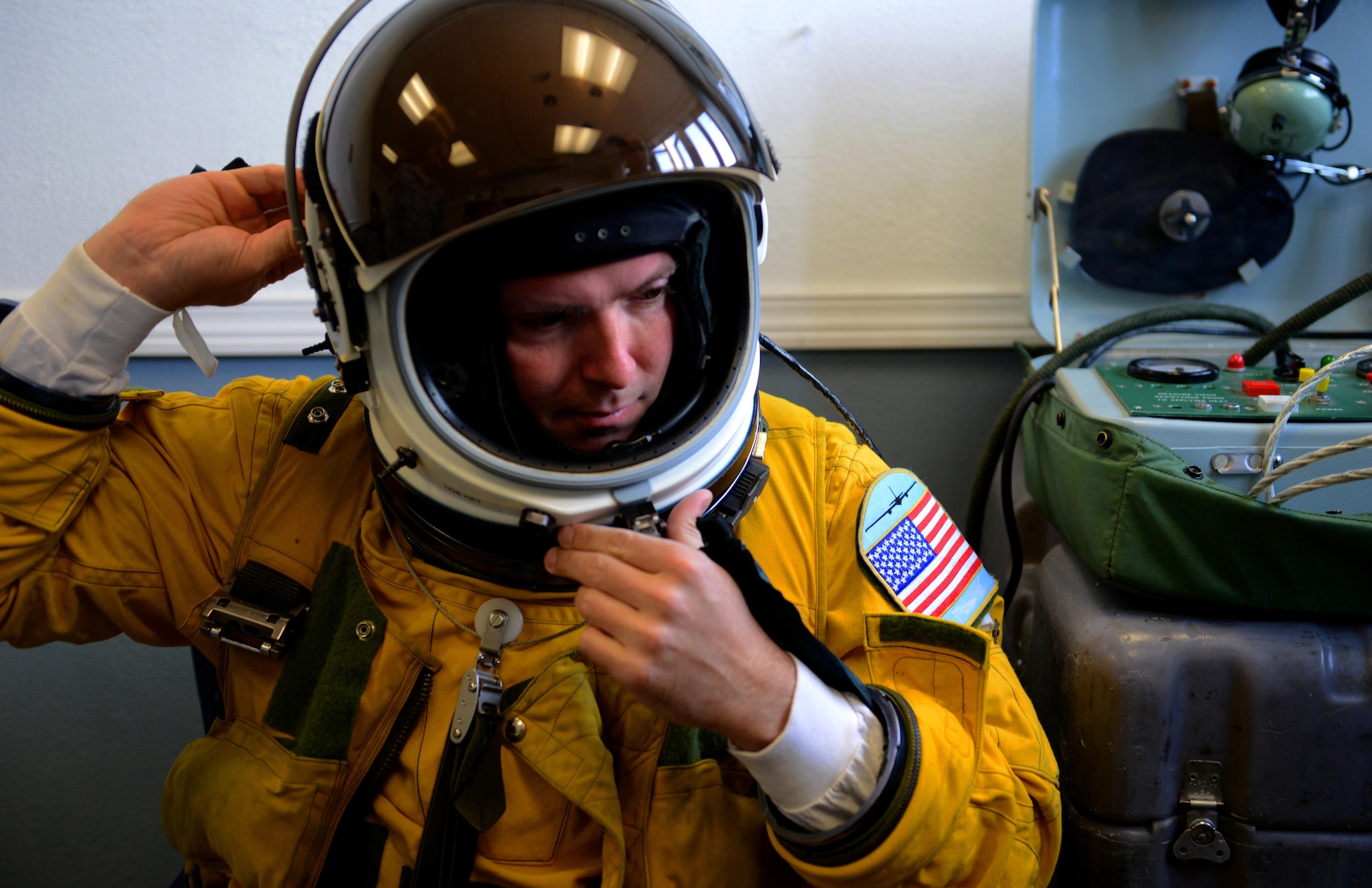A U-2 Dragon lady pilot adjusts his helmet during pre-flight at exercise Northern Edge 17 at Joint Base Elmendorf-Richardson, Alaska, May 8, 2017. The U-2 participated for the first time in Northern Edge, which is a biennial joint training exercise involving approximately 6,000 personnel and 200 fixed wing aircraft, and dates back to 1975. (U.S. Air Force photo/Staff Sgt. Jeffrey Schultze)