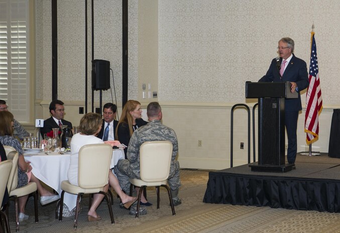 Charleston Mayor John Tecklenburg speaks at the Federal Executive Association’s Annual Federal Employee of the Year Luncheon at Joint Base Charleston, S.C., May 12, 2017. The event recognizes federal employees who go above and beyond their normal duties. The FEA promotes coordination between federal agency programs for maximum public benefit and fosters stronger relationships between the agencies’ management officials.