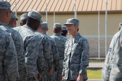 Brig. Gen. Heather Pringle, 502nd Air Base Wing and Joint Base San Antonio commander, converses with Airmen enrolled in security forces technical training at the JBSA Police Week retreat ceremony held in honor of fallen officers May 15, 2017, outside the Security Forces Museum at JBSA-Lackland. National Police Week began in 1962 after President John F. Kennedy signed a proclamation designating May 15 as Peace Officers Memorial Day and the week in which that date falls as Police Week. 