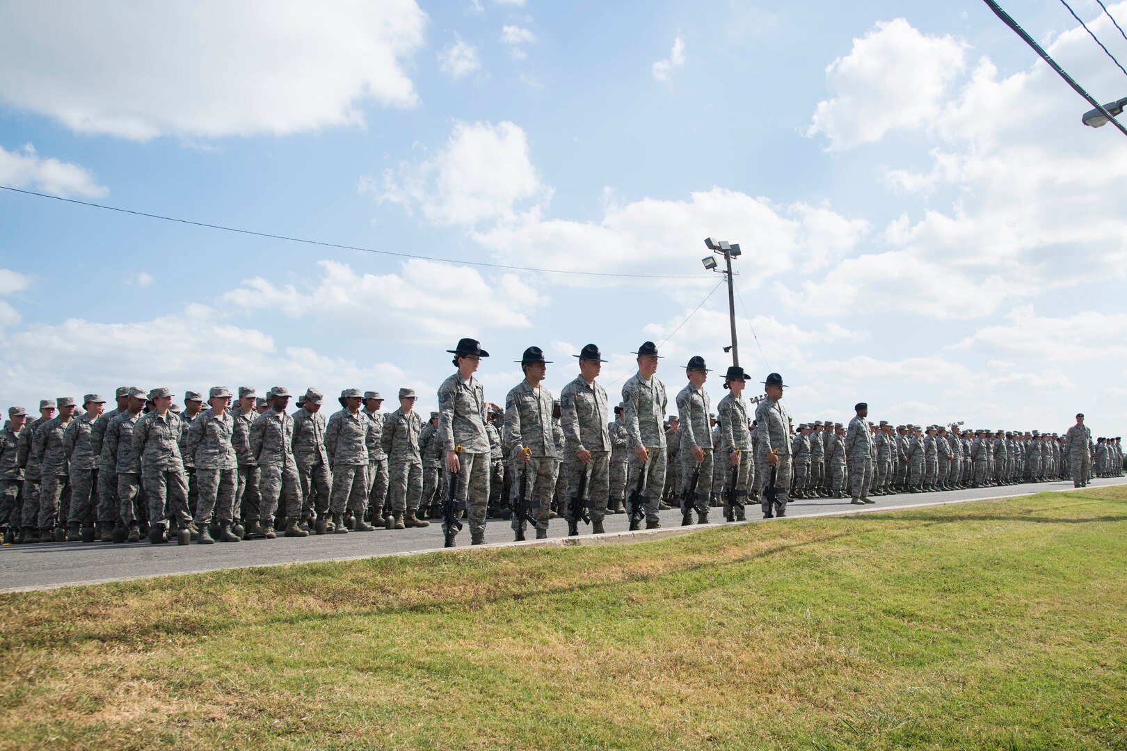 Joint Base San Antonio-Lackland military training instructors prepare for a 21 gun salute at the JBSA Police Week retreat ceremony held in honor of fallen officers May 15, 2017, outside the Security Forces Museum at JBSA-Lackland. National Police Week pays special tribute to those law enforcement officers who have lost their lives in the line of duty for the safety and protection of others. 