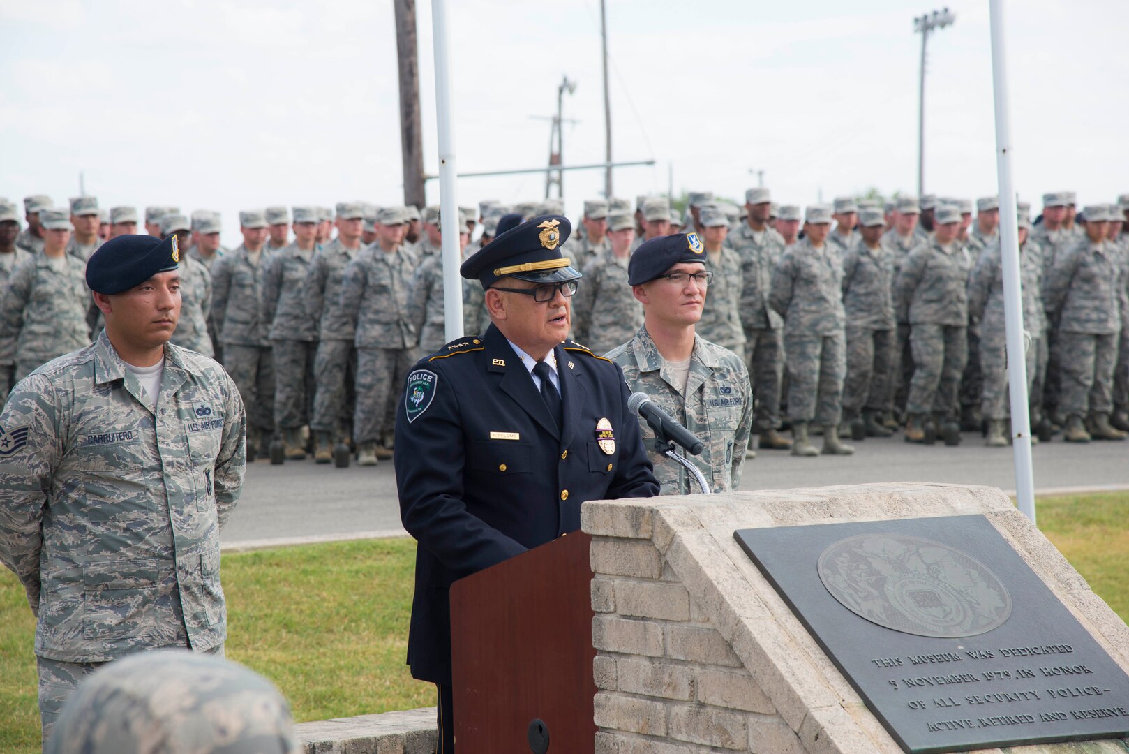 Richard Palomo, Chief of Police for the Southwest Independent School District Police Department, delivers a speech at the Joint Base San Antonio Police Week retreat ceremony held in honor of fallen officers May 15, 2017, outside the Security Forces Museum at Joint Base San Antonio-Lackland. JBSA security forces members and military police officers joined local police departments to honor their comrades who were killed in action. (U.S. Air Force photo by Airman Dillon Parker)