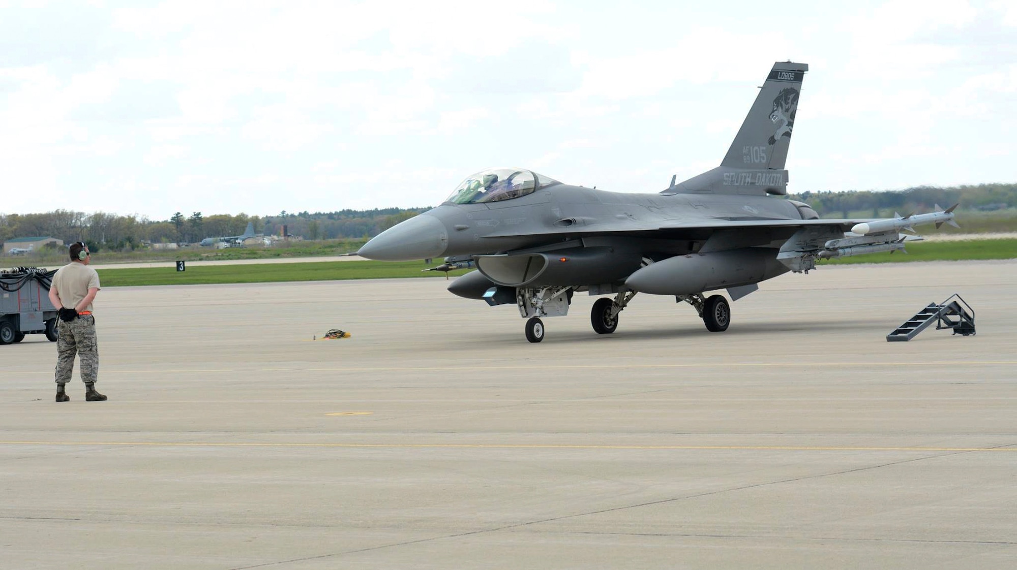Master Sgt. Cameron Allsup, 114th Aircraft Maintenance Squadron crew chief, prepares to launch an F-16 during Exercise Northern Lightning at Volk Field Combat Readiness Training Center, Camp Douglas, Wisconsin, May 1-12, 2017. Northern Lightning is an exercise involving around 1,500 service members from the Air Force, Navy, Marines and National Guard across the country. (U.S. Air National Guard photo by Staff Sgt. Andrea F. Rhode/Released)