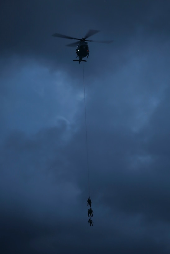 A U.S. Marine Corps UH-1Y Huey assigned to Marine Light Attack Helicopter Squadron 367 hovers over the ground at Landing Zone Westfield during a joint operation training exercise aboard Marine Corps Air Station Kaneohe Bay on May 10, 2017. The mission of HMLA-367 is to support the Marine Air-Ground Task Force commander by providing offensive air support, armed escort and airborne supporting arms coordination, day or night, under all weather conditions during expeditionary, joint, or combined operations. (U.S. Marine Corps photo by Cpl. Zachary Orr)