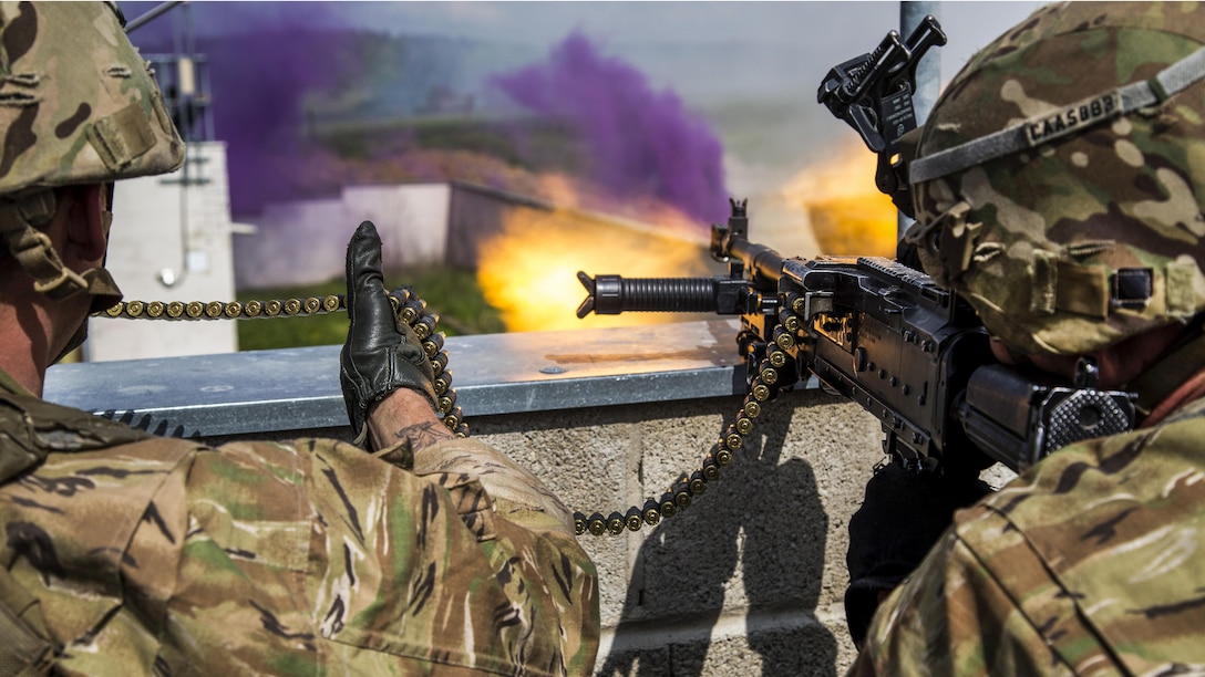 Soldiers return fire while participating in a town defense training scenario as part of exercise Saber Junction 17 at the Hohenfels Training Area in Germany, May 15, 2017. The exercise includes nearly 4,500 participants from 13 NATO and European partner nations. Army photo by Spc. Gage Hull