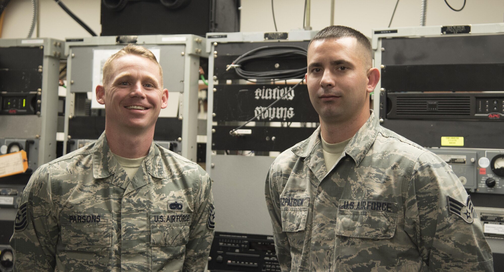 U.S. Air Force Tech. Sgt. Kent Parsons, left, and Senior Airman Sean Fitzpatrick, airfield systems technicians assigned to the 6th Operations Support Squadron, pause for a photo at MacDill Air Force Base Fla., May 16, 2017. Parsons and Fitzpatrick won Air Mobility Command’s Outstanding Airfield Systems awards for 2016. (U.S. Air Force photo by Airman 1st Class Rito Smith)