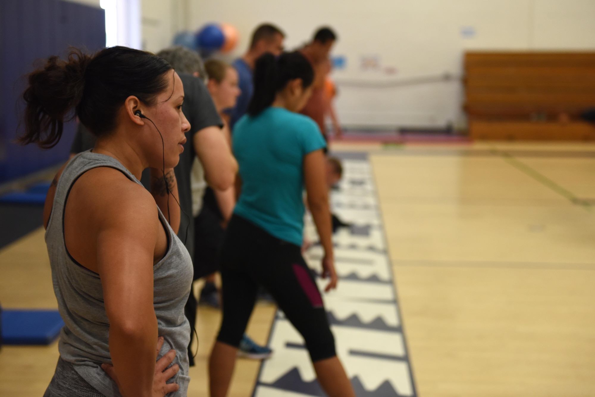 Team V members prepare for the next workout during a functional fitness class, May 15, 2017, Vandenberg Air Force Base, Calif. Functional fitness classes involve multiple, creative exercises that produce quality workouts and prevent monotony. (U.S. Air Force photo by Senior Airman Robert J. Volio/Released)