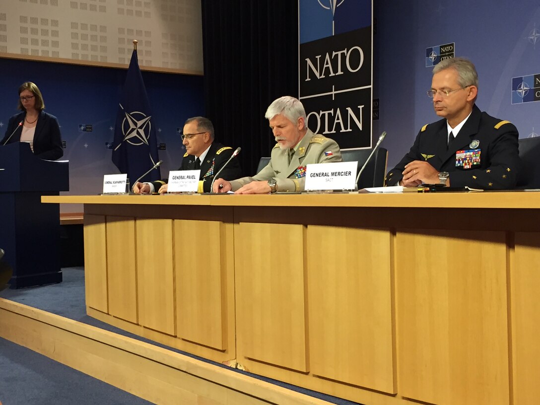 Left to right: U.S. Army Gen. Curtis M. Scaparrotti, NATO's supreme allied commander Europe; Gen. Petr Pavel of the Czech army, the chairman of the NATO Military Committee; and Gen. Denis Mercier of the French air force, NATO's supreme allied commander for transformation, brief the reporters after a meeting of the alliance Military Committee in Brussels, May 17, 2017. DoD photo by Jim Garamone