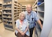 Carmen Lopez and retired U.S. Air Force Master Sgt. Luis Lopez, pose for a photo inside the pharmacy at David Grant USAF Medical Center at Travis Air Force Base, Calif., May 2, 2017. The couple regularly volunteer to hand out medication at the pharmacy and have volunteered at Travis for the past 15 years. (U.S. Air Force  photo/T.C. Perkins Jr.)