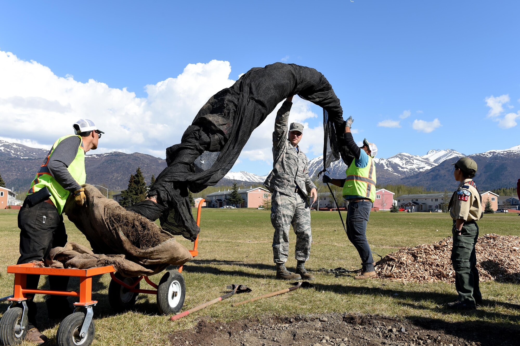 Joint Base Elmendorf-Richardson ecologists and tree lovers prepare to plant a paper birch tree near the JBER library, May 12, 2017. National Arbor Day is always celebrated on the last Friday in April, however, Alaska’s Arbor Day is celebrated on the third Monday in May.