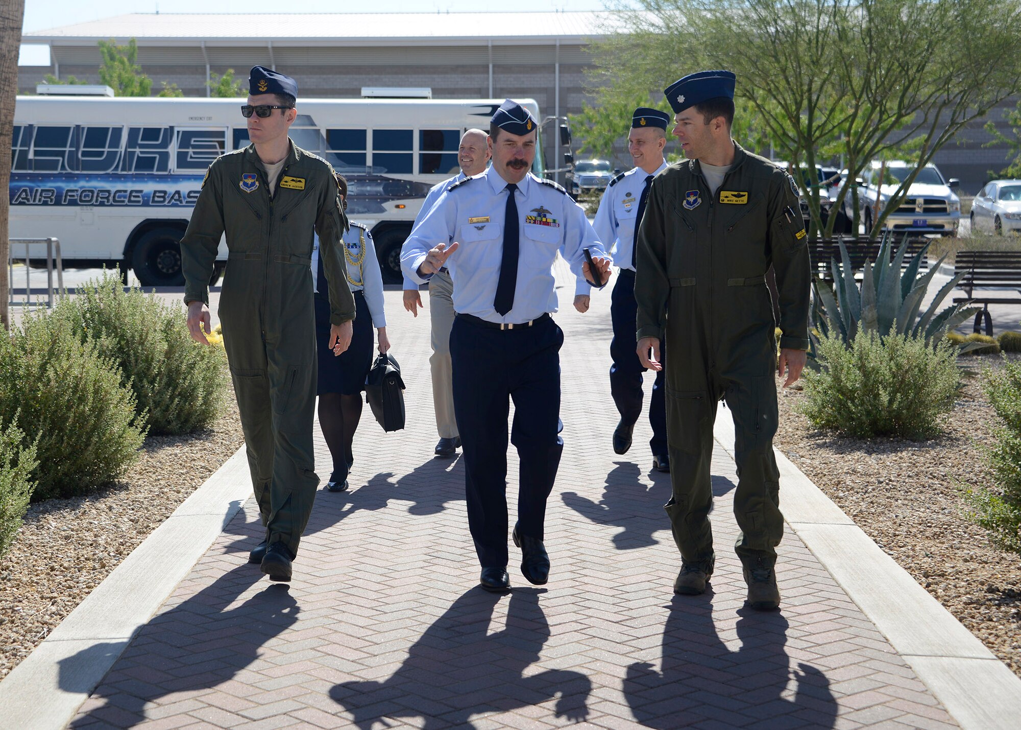 Air Marshal Gavin Davies, Royal Australian Air Force chief, and Lt. Col. Michael Gette, 61st Fighter Squadron commander, enter the 61st Fighter Squadron May 17, 2017, at Luke Air Force Base, Ariz. Davies visited Luke to learn about ongoing and future activities regarding F-35 pilot training and maintenance. (U.S. Air Force photo by Senior Airman Devante Williams) 