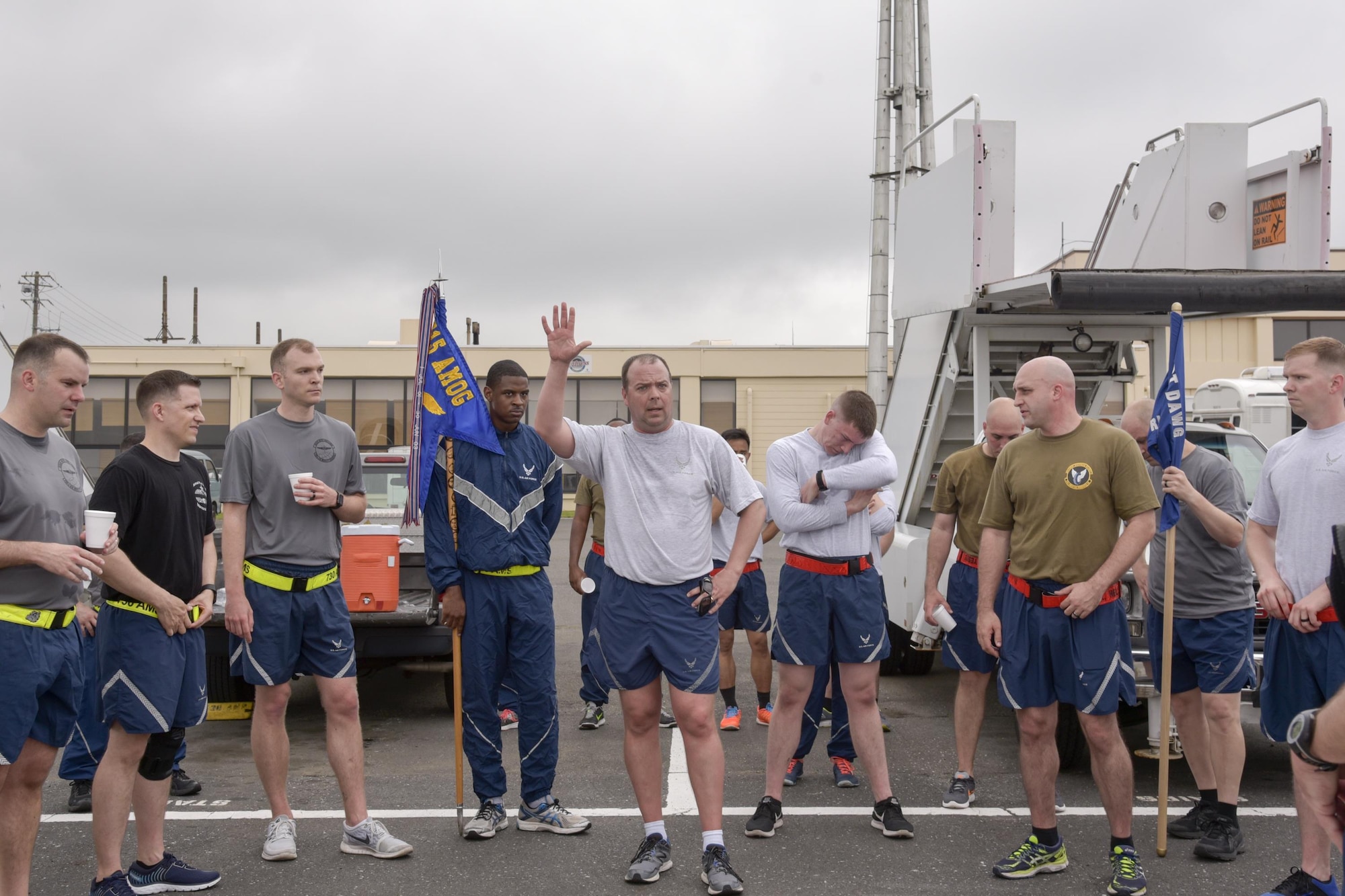 Col. Kevin Wade, 515th Air Mobility Operation Group commander, gives closing remarks after the Port Dawg Memorial Run at Yokota Air Base, Japan, May 15, 2017. The 730th Air Mobility Squadron hosted the Port Dawg Memorial Run in honor of fallen air transportation specialists and brought awareness to Airmen whose job involves many risk factors while also trying to prevent future mishaps. (U.S. Air Force photo by Machiko Arita)