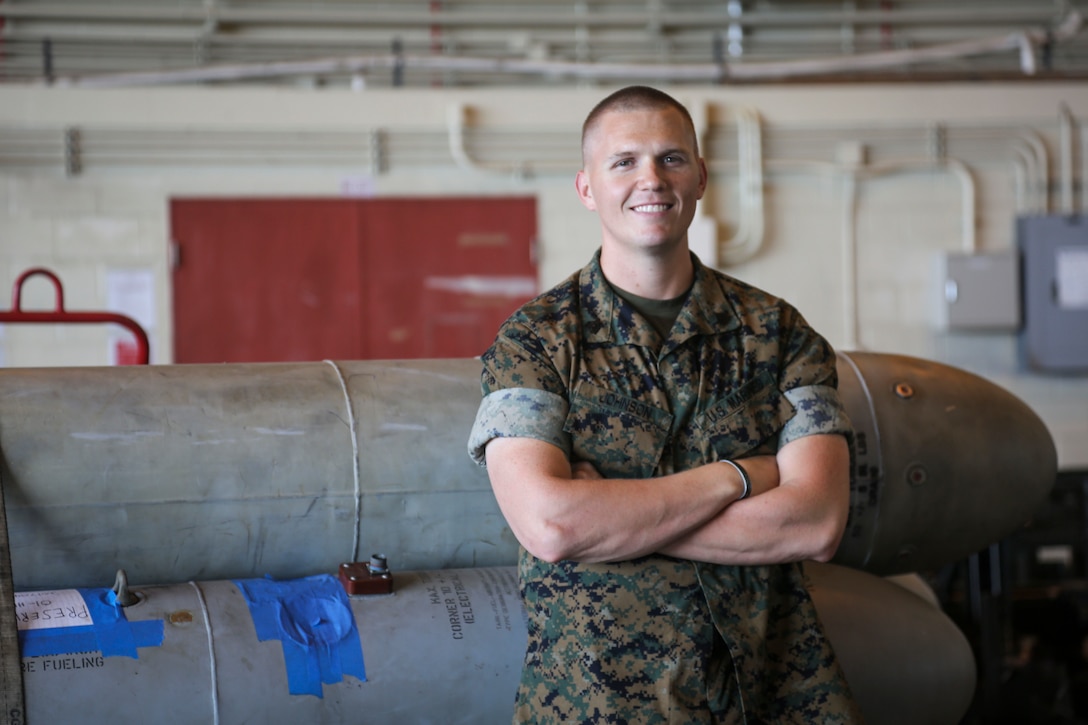 U.S. Marine Corps Sgt. Justin Tyler Johnson receives the Jack W. Demmond Aviation Ground Marine of the Year award at Marine Corps Air Station Futenma, Okinawa, Japan, April 21, 2017. The Marine Corps Aviation Association awarded Johnson for his efforts in transporting Marines and their gear to and from locations by air, land, and sea. “I was excited,” said Johnson. “I wasn’t really expecting it. I just do my job the best way I can.” Johnson, a native of Pensacola, Florida, is an embarkation chief with Marine Medium Tilt Rotor Squadron 262, Marine Aircraft Group 36, 1st Marine Aircraft Wing, III Marine Expeditionary Force. 