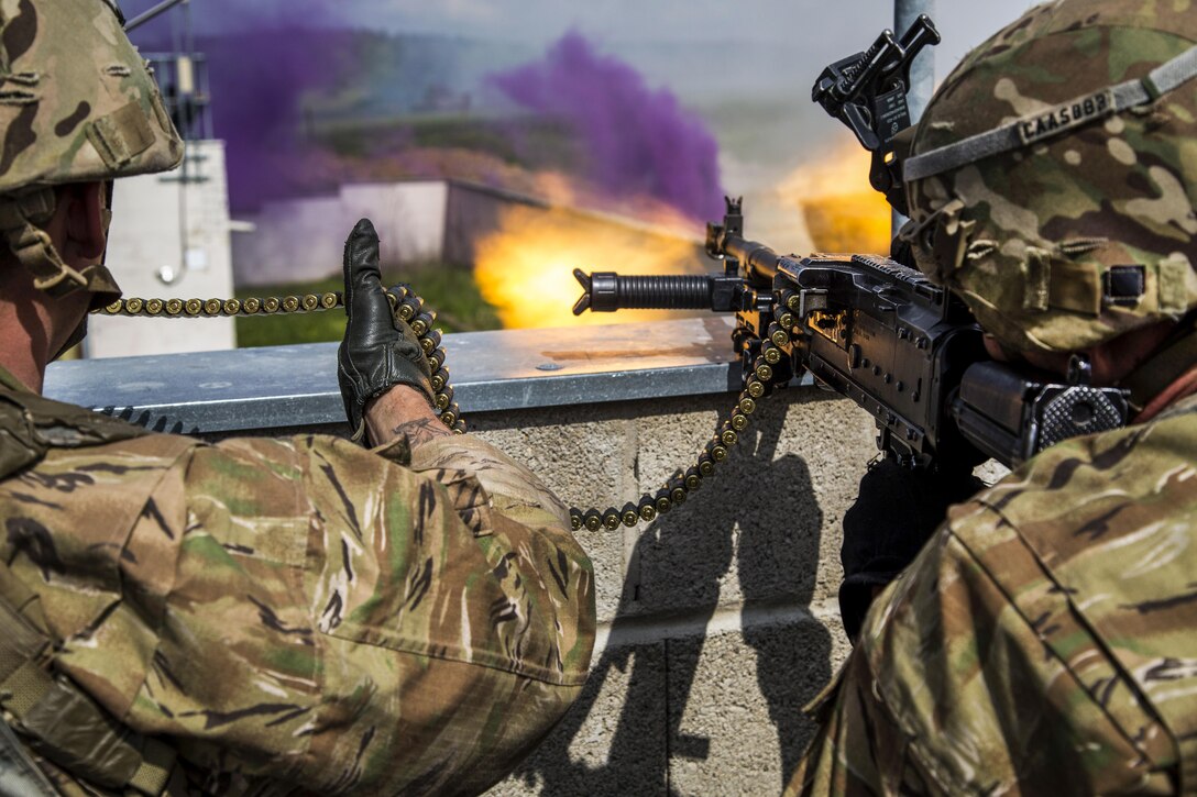 Soldiers return fire while participating in a town defense training scenario as part of exercise Saber Junction 17 at the Hohenfels Training Area in Germany, May 15, 2017. The exercise includes nearly 4,500 participants from 13 NATO and European partner nations. Army photo by Spc. Gage Hull