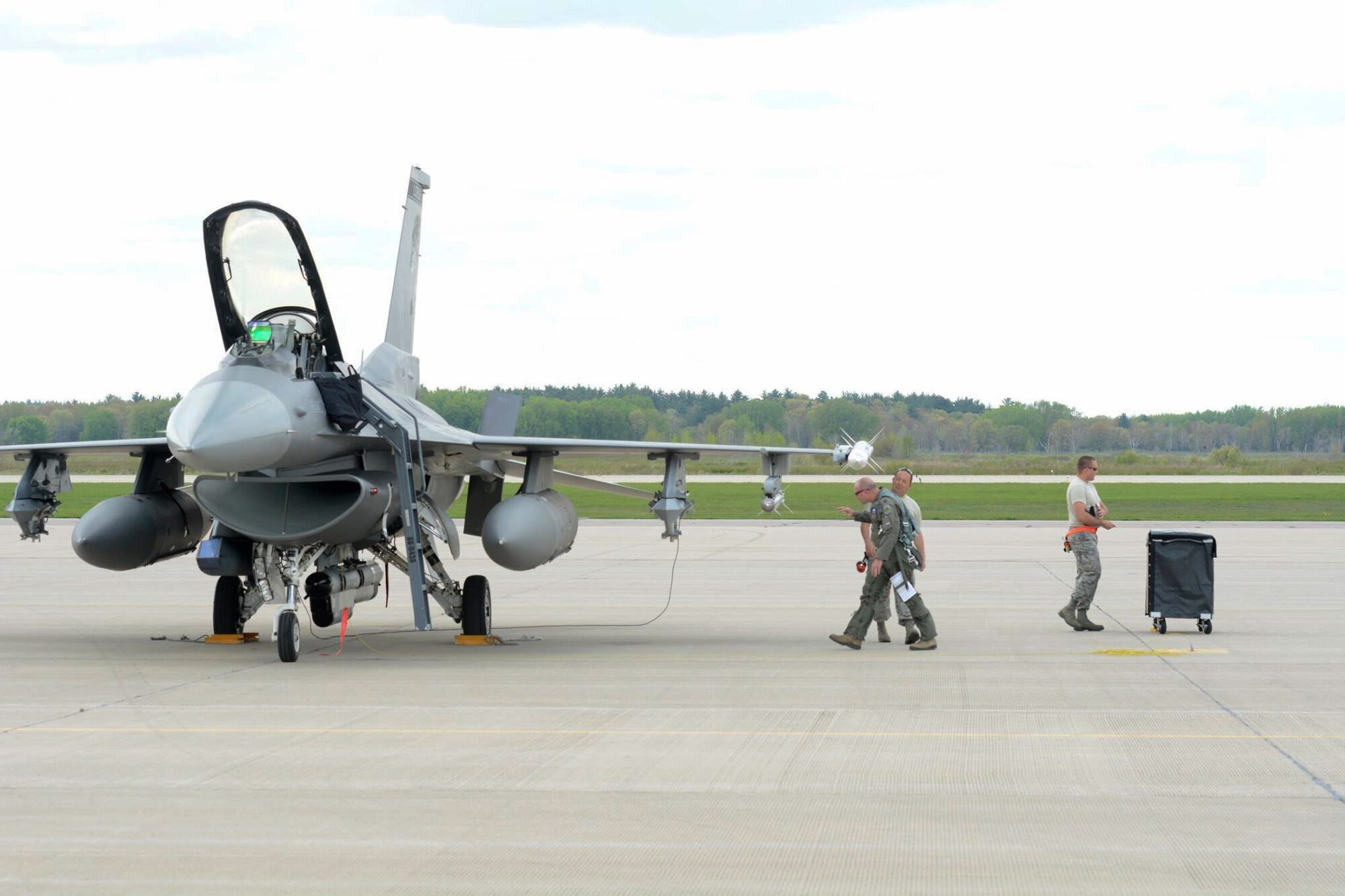 Lt. Col. Todd Sheridan, 175th Fighter Squadron pilot, performs a walk around inspection during Exercise Northern Lightning at Volk Field Combat Readiness Training Center, Camp Douglas, Wisconsin, May 1-12, 2017. Northern Lightning is an exercise involving around 1,500 service members from the Air Force, Navy, Marines and National Guard across the country. (U.S. Air National Guard photo by Staff Sgt. Andrea F. Rhode/Released)