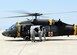 Airmen from the 8th Medical Group carry a simulated patient to a UH-60 Black Hawk medevac helicopter at Kunsan Air Base, Republic of Korea, May 17, 2017. The purpose of the training was aimed to train medics on loading patients onto a helicopter for dust-off. (U.S. Air Force photo/Staff Sgt. Chelsea Sweatt)