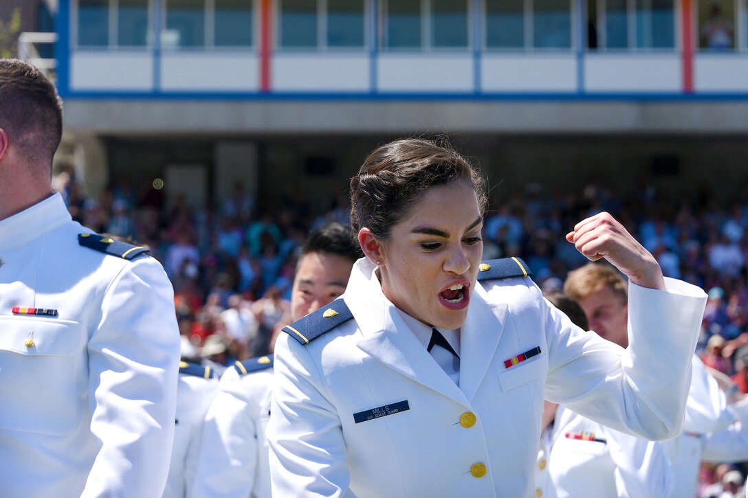 Graduates from the Coast Guard Academy celebrate during the 136th Coast Guard Academy commencement in New London, Conn., May 17, 2017. Coast Guard photo by Petty Officer 2nd Class Patrick Kelley