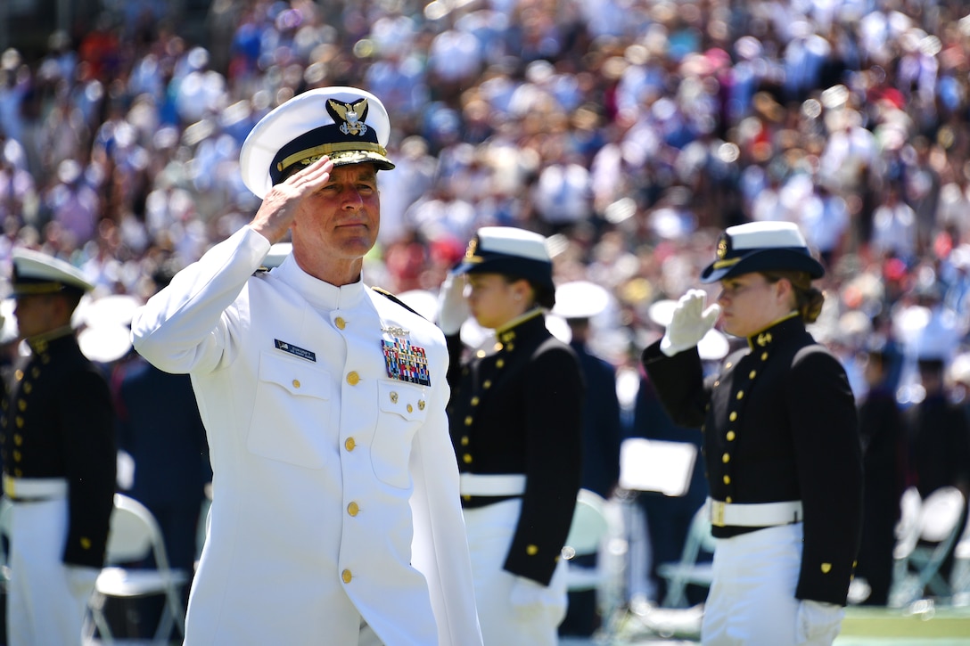 Coast Guard Commandant Adm. Paul Zukunft departs the stage following the 136th Coast Guard Academy commencement in New London, Conn., May 17, 2017. Coast Guard photo by Petty Officer 2nd Class Patrick Kelley 
