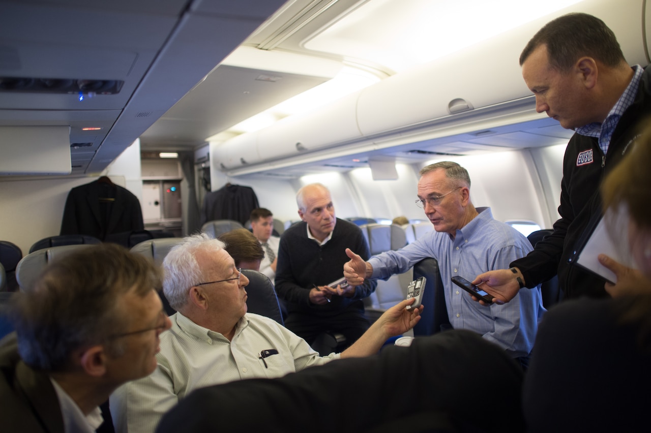 Marine Corps Gen. Joe Dunford, the chairman of the Joint Chiefs of Staff, speaks with reporters on his way back to Washington, D.C., following NATO meetings in Brussels, May 17, 2017. DoD photo by Army Sgt. James McCann