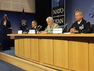 Left to right: U.S. Army Gen. Curtis M. Scaparrotti, NATO's supreme allied commander Europe; Gen. Petr Pavel of the Czech army, the chairman of the NATO Military Committee; and Gen. Denis Mercier of the French air force, NATO's supreme allied commander for transformation, brief the reporters after a meeting of the alliance Military Committee in Brussels, May 17, 2017. 