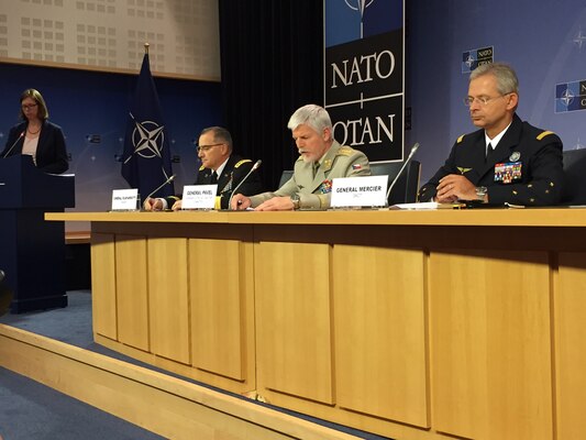 Left to right: U.S. Army Gen. Curtis M. Scaparrotti, NATO's supreme allied commander Europe; Gen. Petr Pavel of the Czech army, the chairman of the NATO Military Committee; and Gen. Denis Mercier of the French air force, NATO's supreme allied commander for transformation, brief the reporters after a meeting of the alliance Military Committee in Brussels, May 17, 2017. 