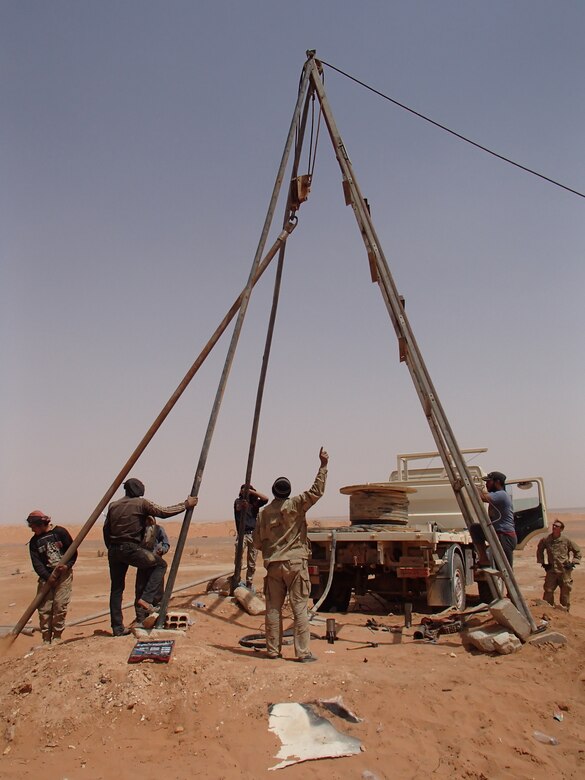 Members of Maghawir al-Thawra work to repair a water well in At Tanf Garrison in southern Syria for partner forces fighting the Islamic State of Iraq and Syria and local residents in the area. The water well is capable of supplying more than 317,000 gallons of water daily. Army photo