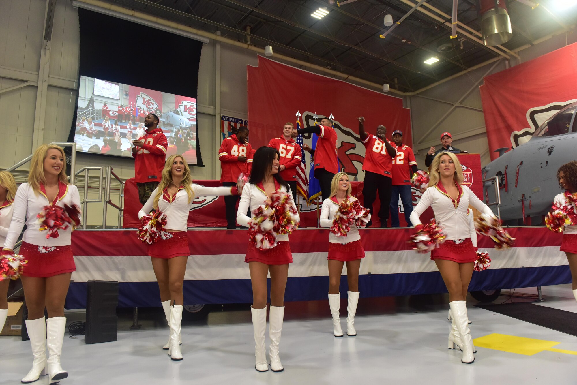 Members of Team Whiteman met current Kansas City Chiefs players, ambassadors, cheerleaders, and the mascot, KC Wolf, during the 2017 Draft Day event at Whiteman Air Force Base, Mo., April 29, 2017. From setting up the festivities in 5 Bay and Hangar 52 to providing security and medical readiness, more than 100 volunteers ensured the event was a success.
