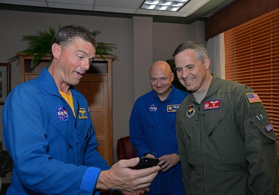 Reid Wiseman, U.S. Navy Cmdr. and astronaut, shares his experiences while in orbit to Col. Thatcher Cordon, commander of the 47th Medical Group, and to Blake Chamberlain, an Air Force Reserves colonel and astronaut, on Laughlin Air Force Base, May 17, 2017.  Wiseman and Chamberlain visited Laughlin to view a demonstration of Cardon’s award winning space suit. (U.S. Air Force photo by Airman 1st Class Daniel Hambor)