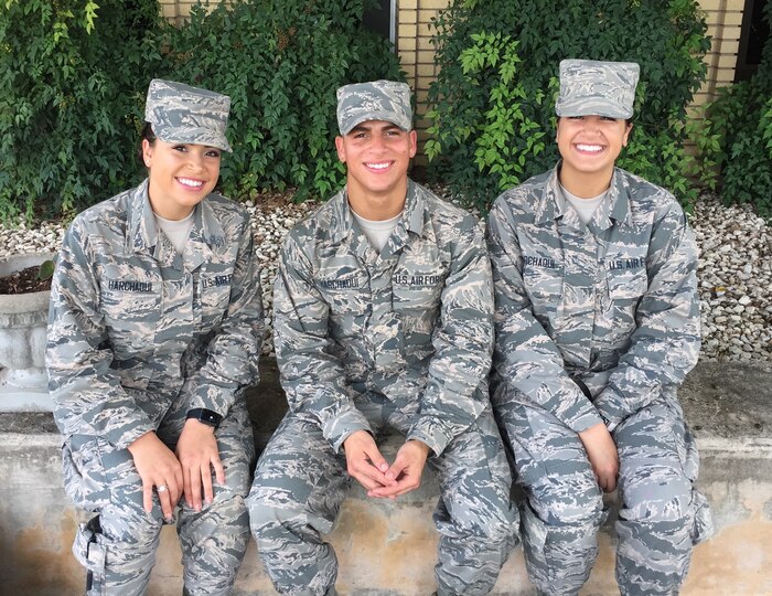 The Harchaoui triplets -- from left, Myriam, a 436th Supply Chain Operations Squadron at Scott Air Force Base, Ill.; Rabah, assigned to the 56th Security Forces Squadron at Luke Air Force Base, Ariz.; and Warda, with the 60th Medical Operations Squadron at Travis Air Force Base, Calif. -- were born in Algeria before moving to the United States. Courtesy photo