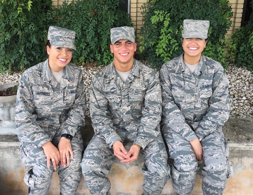 The Harchaoui triplets -- from left, Myriam, a 436th Supply Chain Operations Squadron at Scott Air Force Base, Ill.; Rabah, assigned to the 56th Security Forces Squadron at Luke Air Force Base, Ariz.; and Warda, with the 60th Medical Operations Squadron at Travis Air Force Base, Calif. -- were born in Algeria before moving to the United States. Courtesy photo
