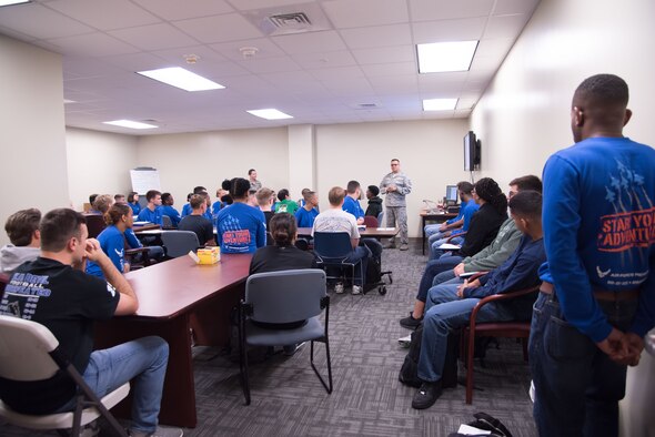 Master Sgt. Carlos Recoder, 433rd Training Squadron military training instructor recruiting noncommissioned officer in charge, speaks to the 403rd Wing Development and Training Flight about what to expect during basic military training May 6, 2017 at Keesler Air Force Base, Mississippi. (U.S. Air Force photo/Staff Sgt. Heather Heiney)