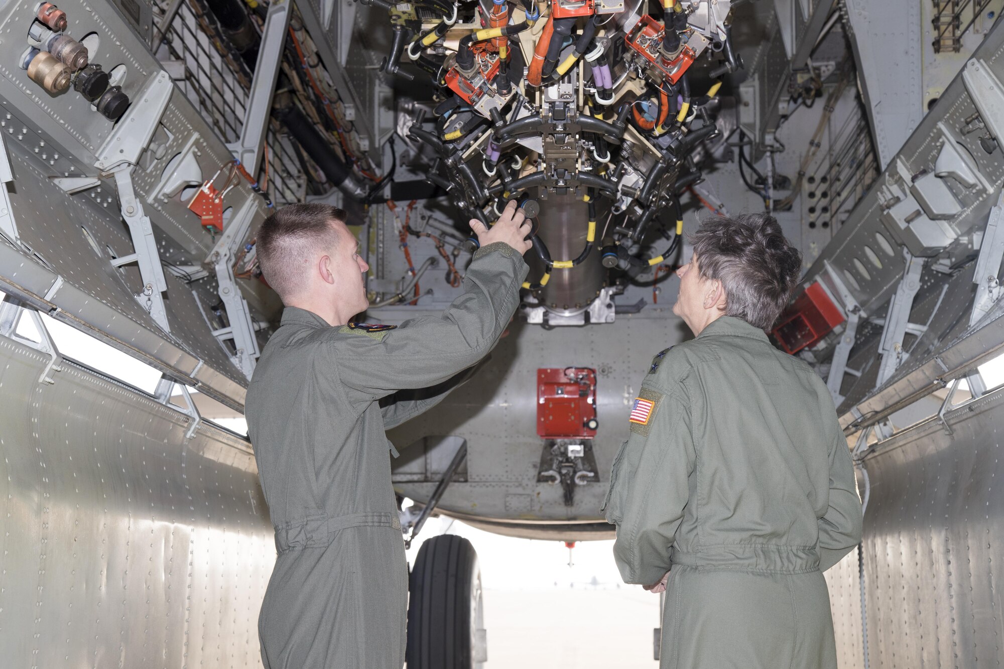 Maj. Timothy Lau, 419th Flight Test Squadron, shows Gen. Ellen Pawlikowski, commander of Air Force Materiel Command, the bomb bay of a B-52 Stratofortress May 12. (U.S. Air Force photo by Christian Turner)