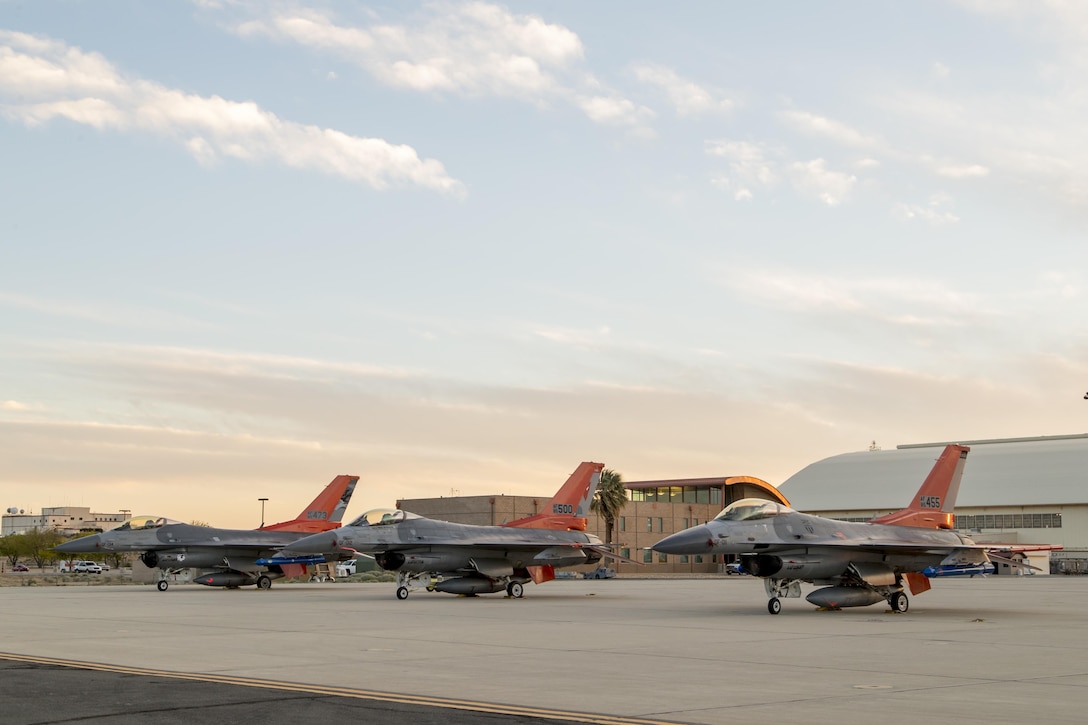 Three QF-16s from Tyndall Air Force Base, Florida, and Holloman Air Force Base, New Mexico, sit on the Edwards AFB flightline April 28. The full-scale aerial targets were requested by the Joint Operational Test Team to assist with test design development for upcoming operational testing of the F-35 Joint Strike Fighter. (U.S. Air Force photo by Chris Higgins)