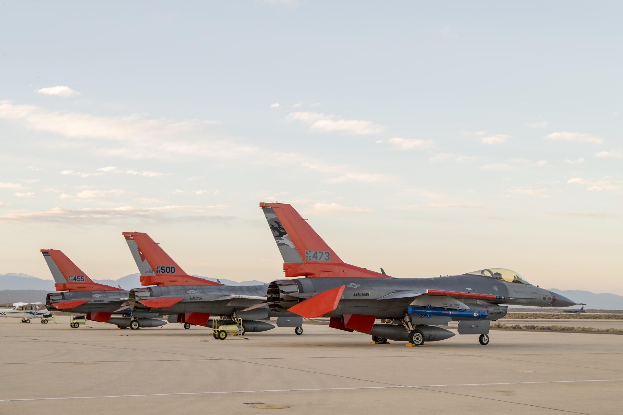 Three QF-16s from Tyndall Air Force Base, Florida, and Holloman Air Force Base, New Mexico, sit on the Edwards AFB flightline April 28. The full-scale aerial targets were requested by the Joint Operational Test Team to assist with test design development for upcoming operational testing of the F-35 Joint Strike Fighter. (U.S. Air Force photo by Chris Higgins)