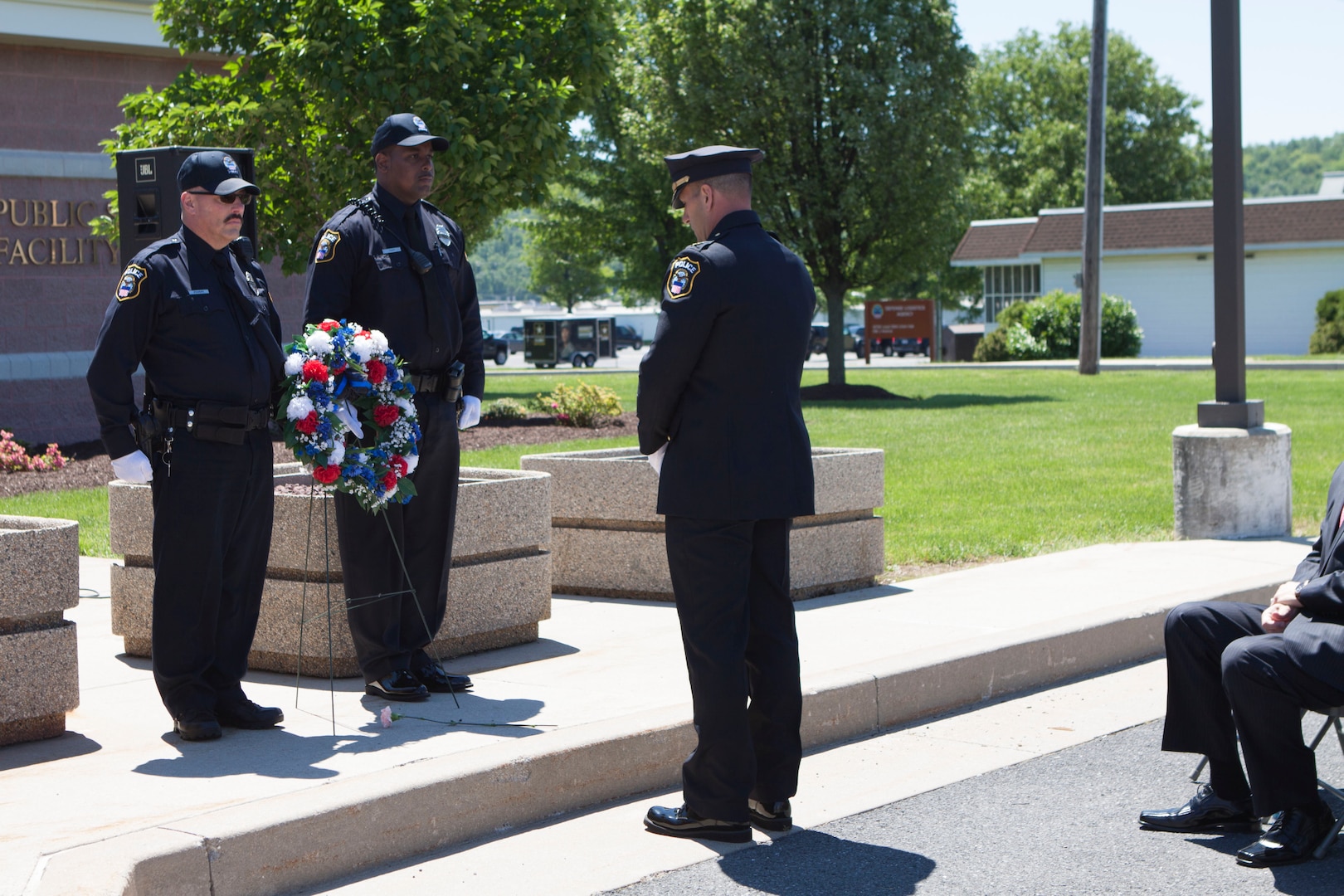 Distribution police chief Douglas Schraeder takes a moment of silence to show his respect for the men, women and K9’s who have died in the line of duty nationwide at the National Police Week wreath laying ceremony on May 15.