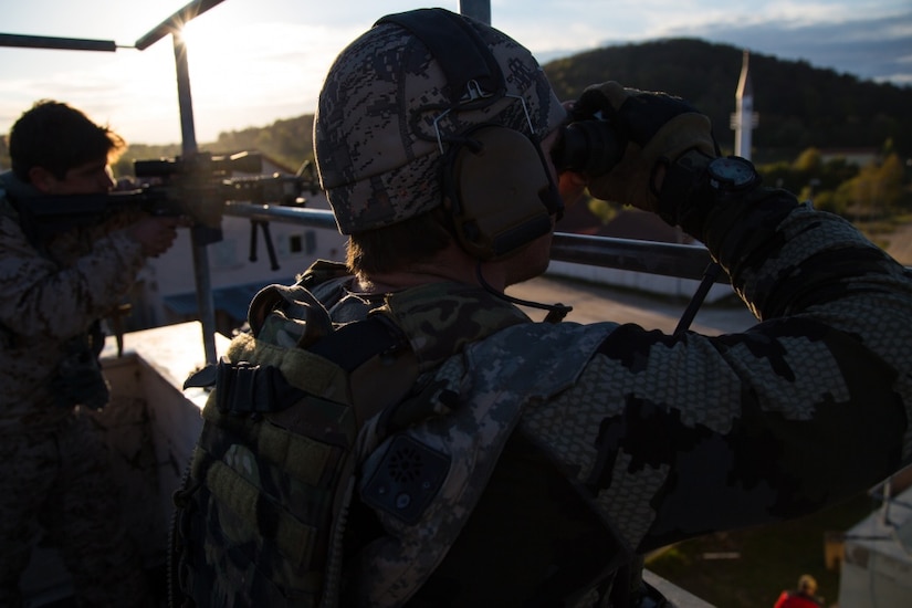 A Naval Special Warfare team surveys an enemy target during Exercise Saber Guardian 17 at the Joint Multinational Readiness Center at Hohenfels, Germany, May 1, 2017. Exercise Saber Junction 17 is a U.S. Army Europe-directed exercise designed to assess the readiness of the Army's 2nd Cavalry Regiment to conduct unified land operations alongside NATO allies and partners. Army photo by Spc. Gage Hull