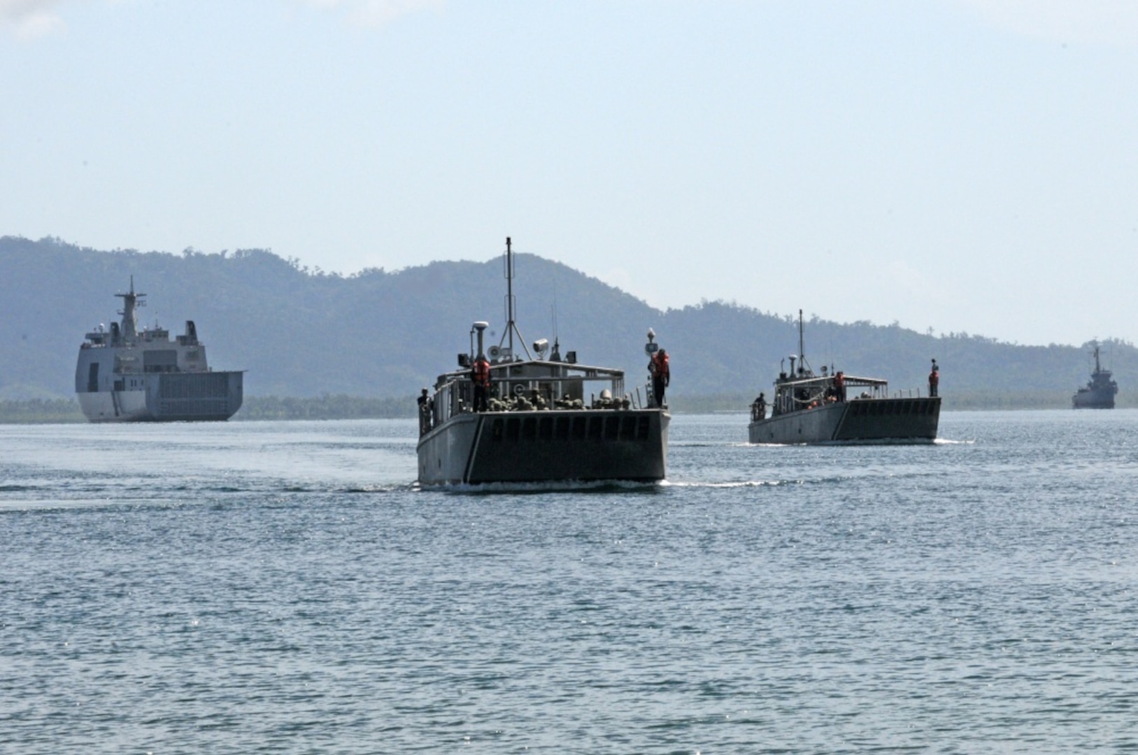 Armed Forces of the Philippines landing craft approach Motiong Beach, Casiguran, during civil military activities from the sea, May 15, 2017. The LCUs carried both U.S. and Philippine forces who were training for humanitarian assistance and disaster response operations. Balikatan is an annual U.S.-Philippine bilateral military exercise focused on a variety of missions, including humanitarian assistance and disaster relief, counterterrorism and other combined military operations.