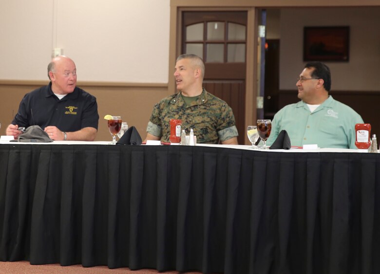 Combat Center Commanding General, Brig. Gen. William F. Mullen III enjoys lunch with Chairman Robert Lovingood, 1st District Supervisor and Chairman James Ramos, 3rd District Supervisor, during a tour of the Marine Corps Air Ground Combat Center, Twentynine Palms, Calif., for the San Bernardino County Board of Supervisors May 12, 2017. The tour was hosted by G-5 Government and External Affairs. (U.S. Marine Corps photo by Cpl. Medina Ayala-Lo)