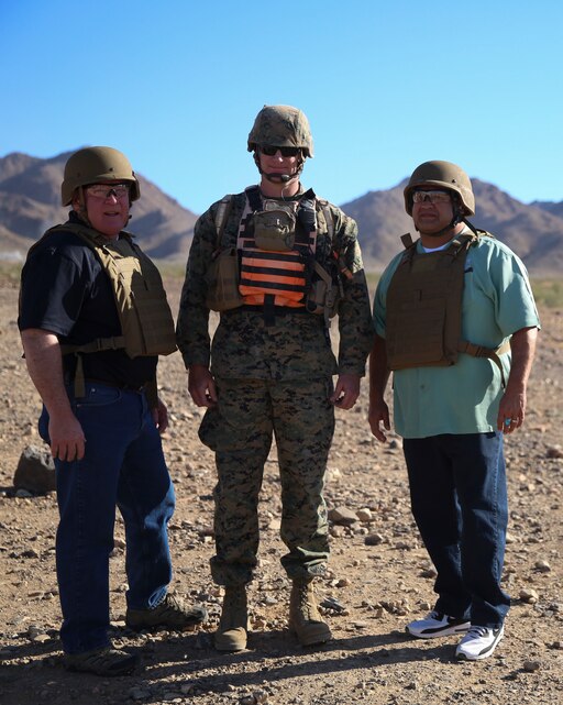 Lt. Col. Jason Roach, operations officer, Tactical Training and Exercise Control Group, takes a photo with Chairman Robert Lovingood, 1st District Supervisor and Chairman James Ramos, 3rd District Supervisor, during a tour of the Marine Corps Air Ground Combat Center, Twentynine Palms, Calif., for the San Bernardino County Board of Supervisors May 12, 2017. The tour was hosted by G-5 Government and External Affairs. (U.S. Marine Corps photo by Cpl. Medina Ayala-Lo)