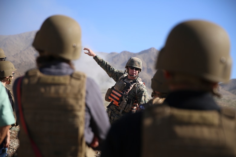 Lt. Col. Jason Roach, operations officer, Tactical Training and Exercise Control Group, briefs the San Bernardino County Board of Supervisors on the training that occurs aboard the Marine Corps Air Ground Combat Center, Twentynine Palms, Calif., May 12, 2017. The tour was hosted by G-5 Government and External Affairs, (U.S. Marine Corps photo by Cpl. Medina Ayala-Lo)