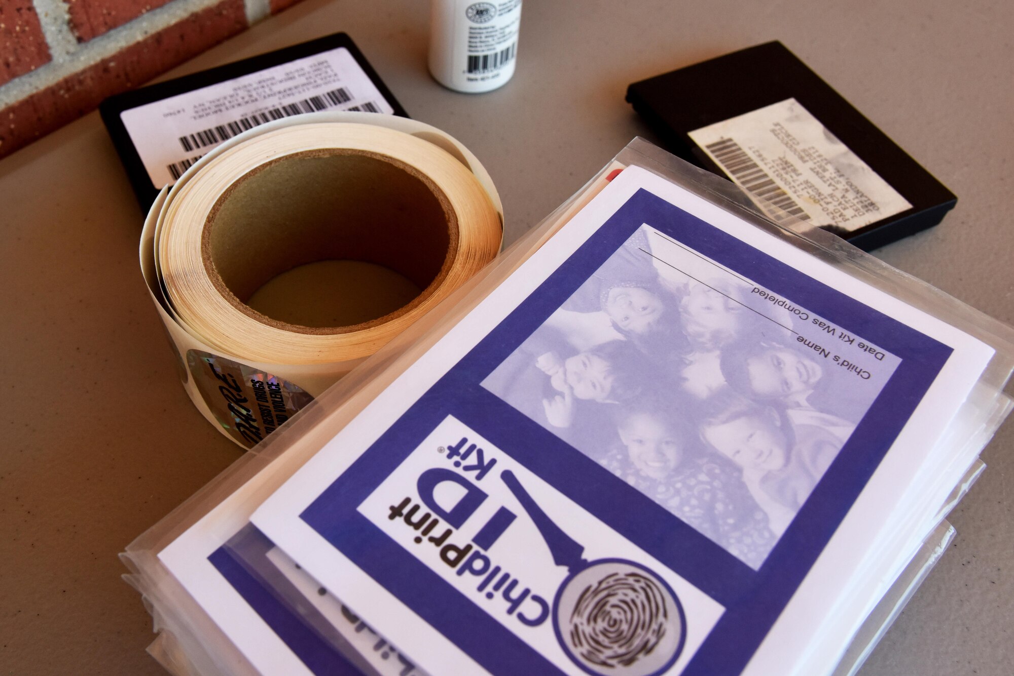 The 17th Security Forces Squadron provided fingerprinting for children at the commissary on Goodfellow Air Force Base, Texas, May 17, 2017. The 17th SFS provided parents with a chance to have their child’s prints put into the FBI database as part of Police Week. (U.S. Air Force photo by Staff Sgt. Joshua Edwards/Released)