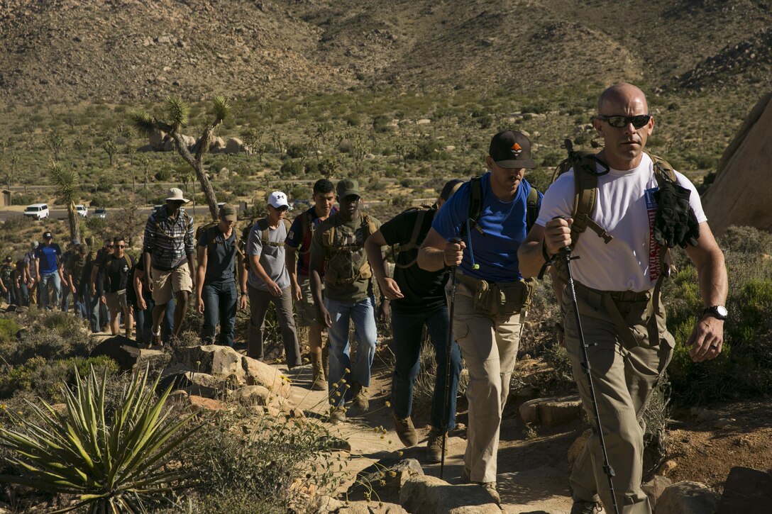 1st Sgt. Ryan Cantrell, Company B First Sergeant, Marine Corps Communication-Electronics School, leads the Marines on a hike in the Round Table Mentorship Program up Ryan Mountain in Joshua Tree National Park, Calif., May 12, 2017. Round Table is a mentorship program created by MCCES to break down walls between leadership and junior Marines by encouraging open dialogue and develop professional relationships across the ranks. (U.S. Marine Corps photo by Cpl. Dave Flores)