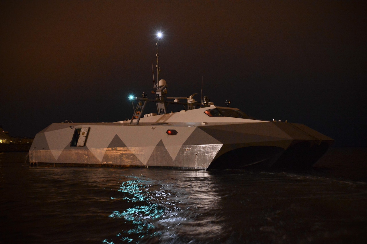 The Navy's high-speed experimental boat Stiletto pulls in to refuel before heading back out for evening observations. Navy photo