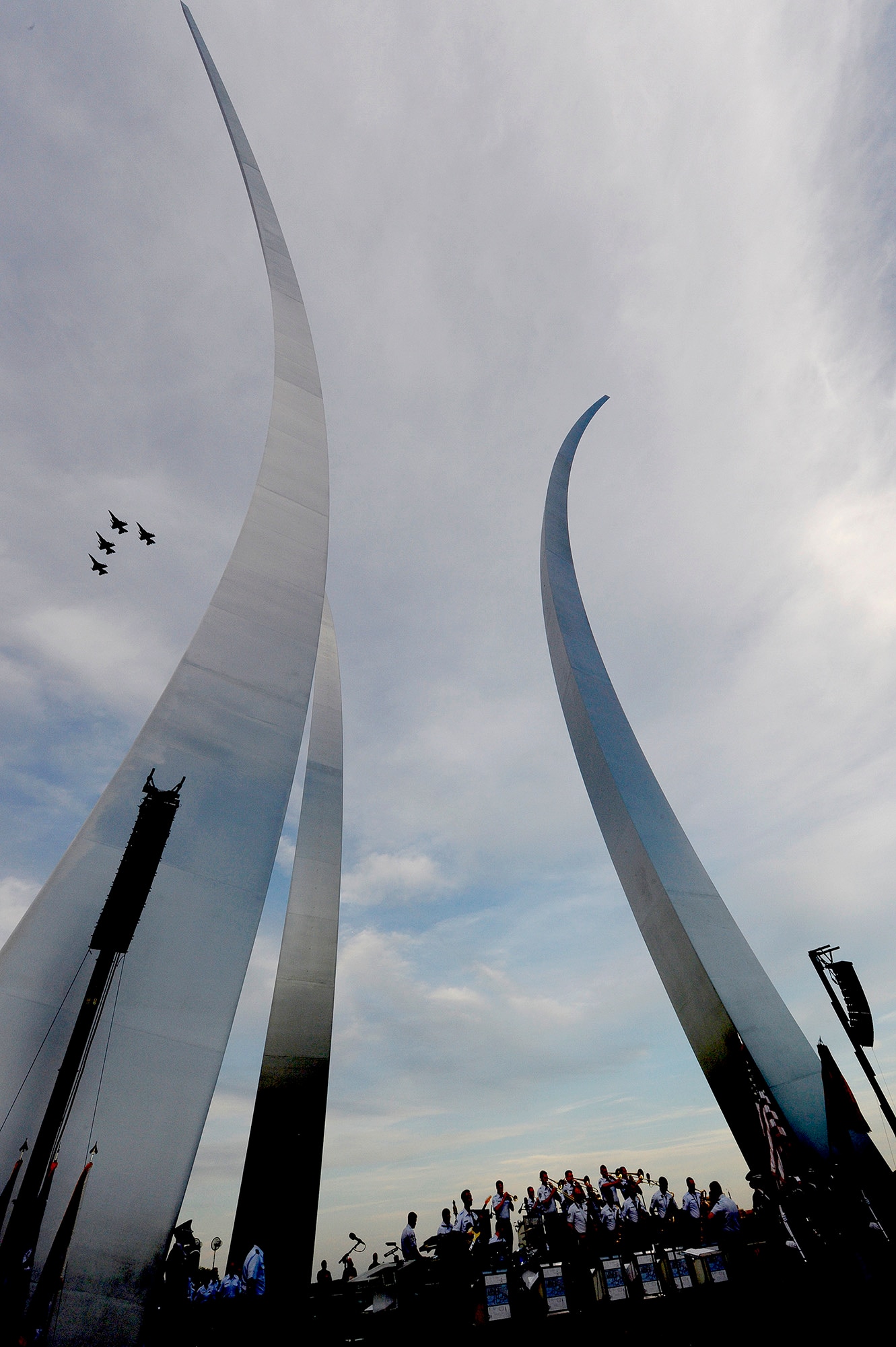 Air Force birthday celebration continues as four F-16 Fighting Falcons fly over the Air Force Memorial during the Air Force Band's summer series, Heritage to Horizons, in Arlington, Va., May 17, 2017. (U.S. Air Force photo/Master Sgt. Bryan Franks)
