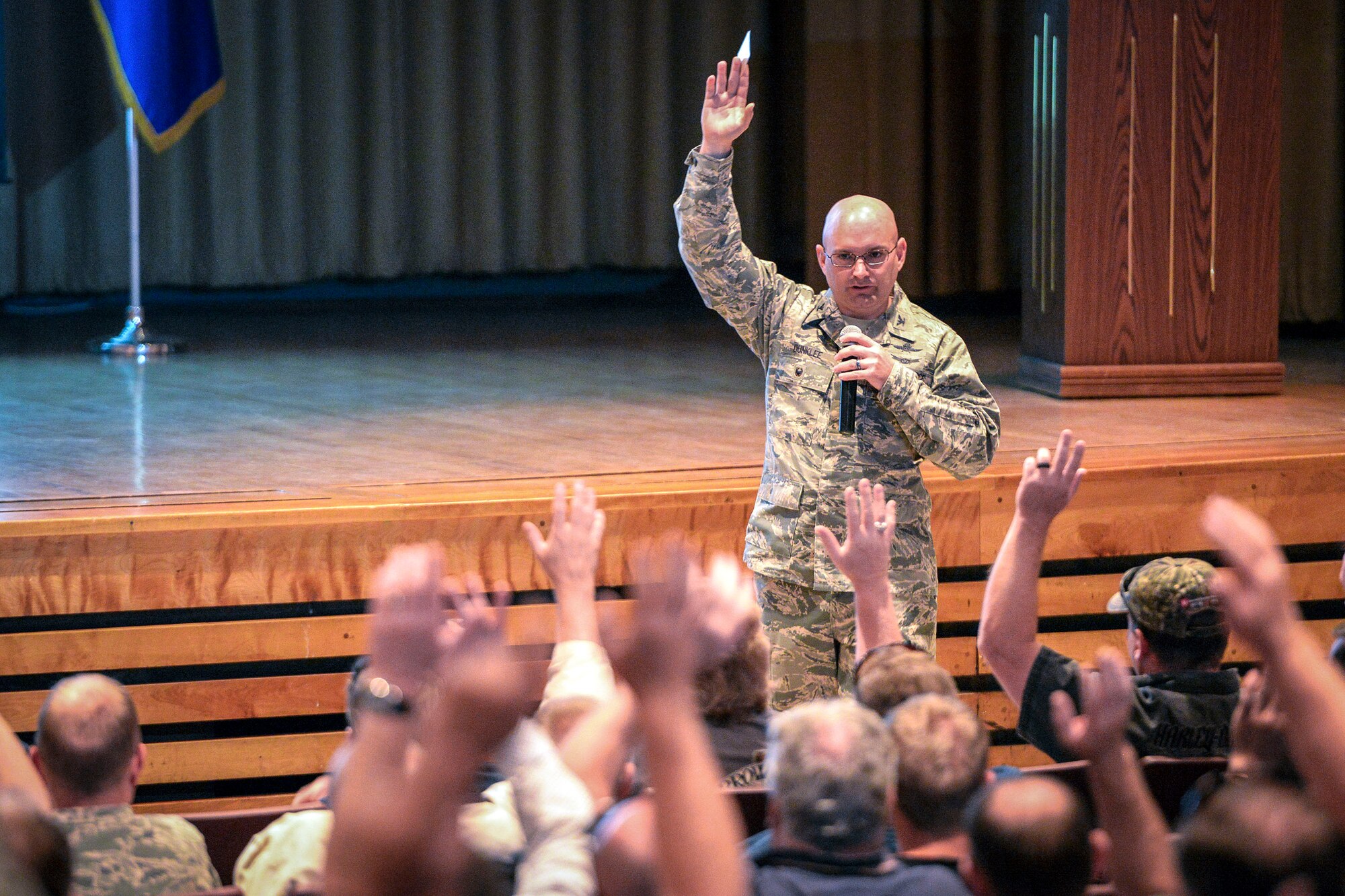 Col. David Dunklee, 75th Air Base Wing vice commander, asks for a show of hands from those who have attended Motorcycle Safety Foundation training. Dunklee provided opening remarks May 11 at the Hill Air Force Base during annual motorcycle safety briefings. (U.S. Air Force/Paul Holcomb)
