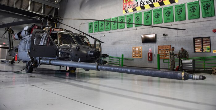 An HH-60G Pave Hawk helicopter assigned to the 66th Rescue Squadron tests its fuel probe extension at Nellis Air Force Base, Nev., May 10, 2017. During air-to-air refueling, the helicopter’s fuel probe extends to nearly double its length to prevent the rotary blades from coming into contact with the fuel line and damaging or completely cutting it. (U.S. Air Force photo by Airman 1st Class Andrew D. Sarver/Released)