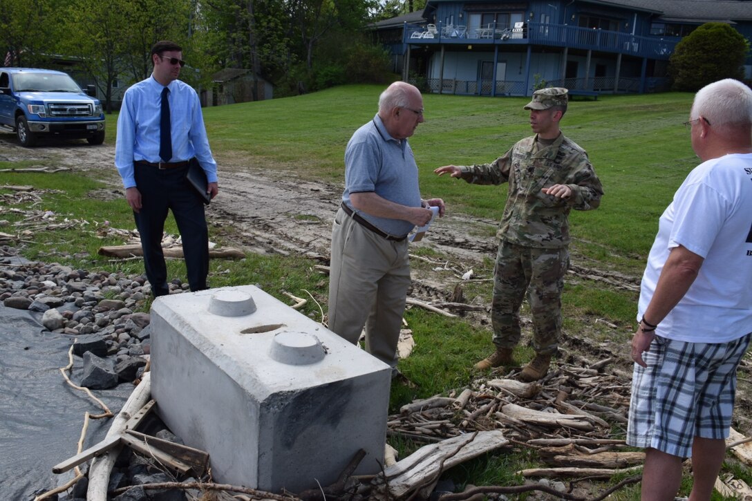 U.S. Army Corps of Engineers Buffalo District Commander Adam Czekanski met with the Mayor of Sodus, New York Chris Tertinek (both centered) and local emergency management officials to discuss Army Corps of Engineers flood supplemental support efforts. They also toured areas affected by high Lake Ontario water in Sodus, New York.   
