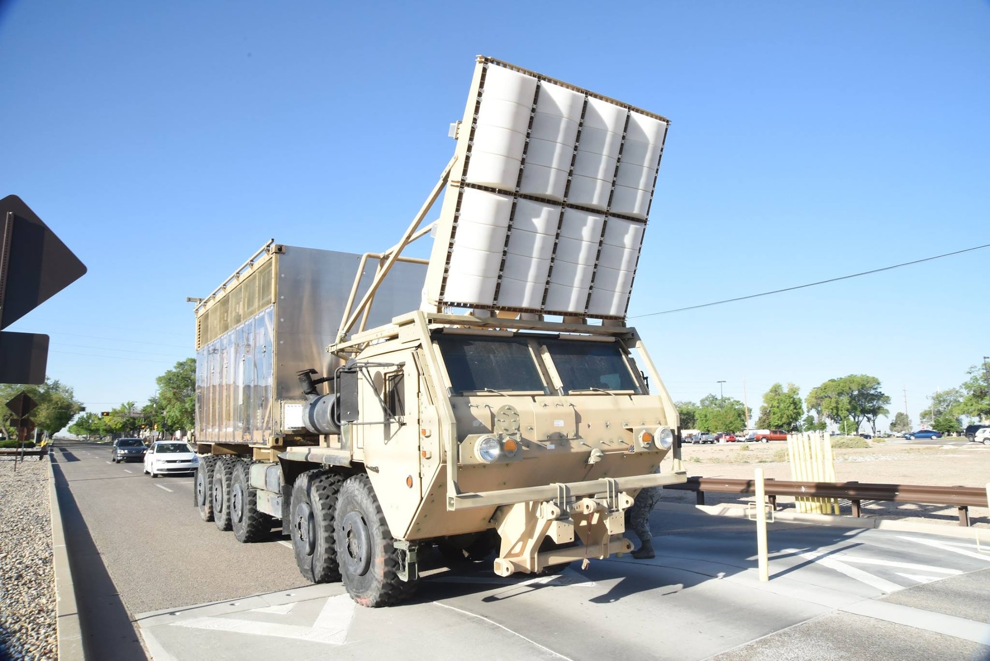 MAX POWER drives out the Carlisle gate of Kirtland Air Force Base, May 16, 2017. The program will transfer to the US Army’s Armament Research, Development and Engineering Center, or ARDEC, headquartered at Picatinny Arsenal, N.J.  ARDEC will continue R&D on MAX POWER locally however, at New Mexico Tech’s Energetic Materials Research and Testing Center near Socorro. (U.S. Air Force Photo/Senior Airman Chandler Baker)